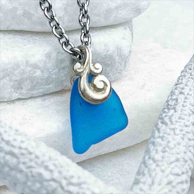 Brilliant Turquoise Sea Glass Pendant with Playful Decorative Notch |View the entire collection of guaranteed authentic Sea Glass! Real Sea Glass Necklaces | Bracelets | Earrings | Rings | Rare Colors Our Specialty | 30+ Years Experience