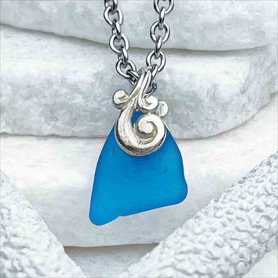 Brilliant Turquoise Sea Glass Pendant with Playful Decorative Notch |View the entire collection of guaranteed authentic Sea Glass! Real Sea Glass Necklaces | Bracelets | Earrings | Rings | Rare Colors Our Specialty | 30+ Years Experience