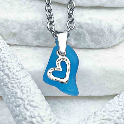 Daring, Dynamic Duo of Turquoise Sea Glass Pendant and Sterling Silver Charm | View the entire collection of guaranteed authentic Sea Glass! Real Sea Glass Necklaces | Bracelets | Earrings | Rings | Rare Colors Our Specialty | 30+ Years Experience
