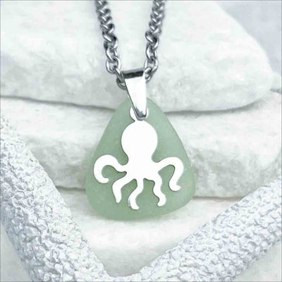 Whimsy and Wit, this Seafoam Sea Glass Pendant is Partnered with a Sterling Silver Octopus Charm| View the entire collection of guaranteed authentic Sea Glass! Real Sea Glass Necklaces | Bracelets | Earrings | Rings | Rare Colors Our Specialty | 30+ Years Experience