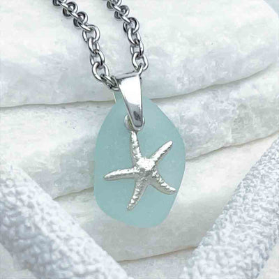 Imaginative Ice Aqua Sea Glass Pendant Partnered with Sterling Silver Starfish| Guaranteed Genuine Beach Gathered Sea Glass in Necklaces, Pendants, Rings, Bracelets and Anklets | 30+ Years Experience | Comes Complete with Sea Glass Guide