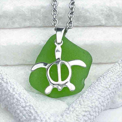 This Lively Green Sea Glass Pendant is Paired with a Winsome Turtle Charm. Guaranteed Genuine Beach Gathered Sea Glass in Necklaces, Pendants, Rings, Bracelets and Anklets | 30+ Years Experience | Comes Complete with Sea Glass Guide
