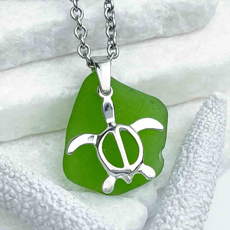 This Lively Green Sea Glass Pendant is Paired with a Winsome Turtle Charm. Guaranteed Genuine Beach Gathered Sea Glass in Necklaces, Pendants, Rings, Bracelets and Anklets | 30+ Years Experience | Comes Complete with Sea Glass Guide