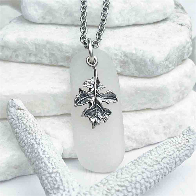 Striking Crystal Clear Sea Glass Pendant with Autumn Leaf Charm| View the entire collection of guaranteed authentic Sea Glass! Real Sea Glass Necklaces | Bracelets | Earrings | Rings | Rare Colors Our Specialty | 30+ Years Experience