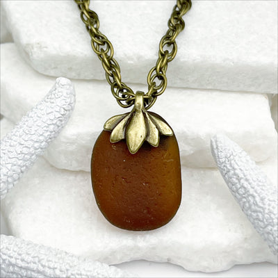 Rootbeer Bottle Bottom Sea Glass with a Bronze Decorative Bail 