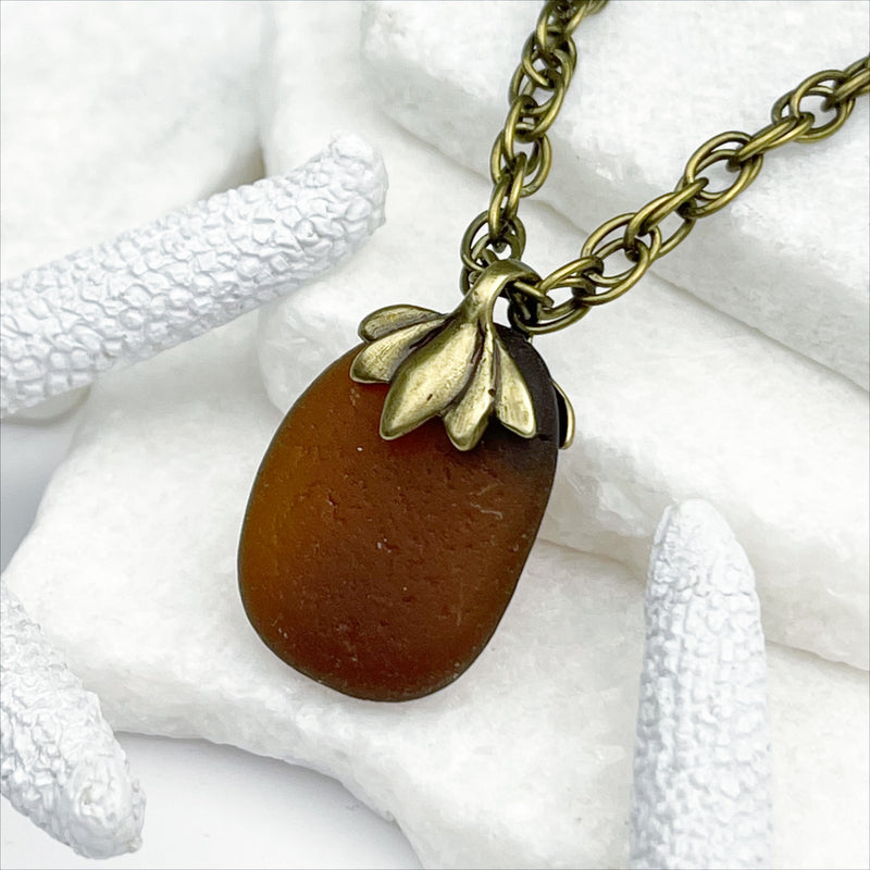 Rootbeer Bottle Bottom Sea Glass with a Bronze Decorative Bail 