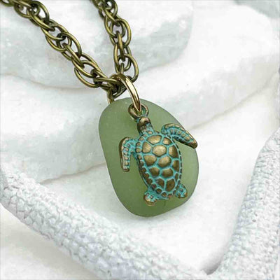 Champagne Green Sea Glass Pendant with Bronze and Turquoise Sea Turtle Charm